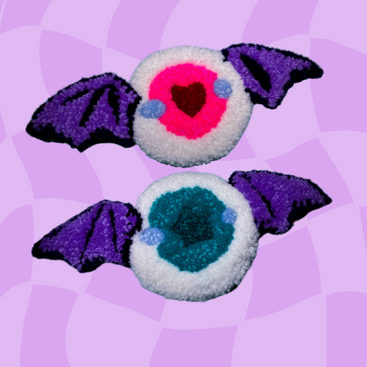 Winged eye wall rug
